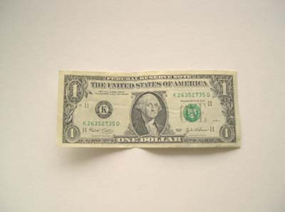 dollar bill ready to fold