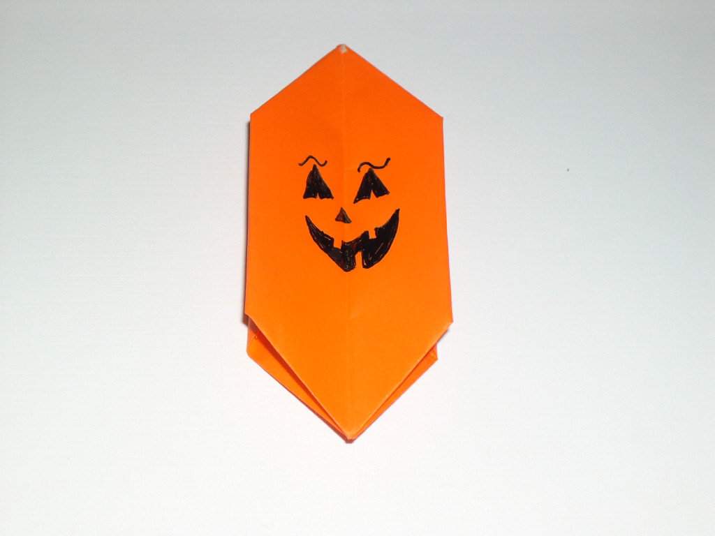 draw pumpkin face on origami