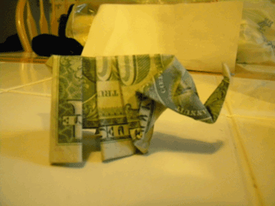 dollar bill origami butterfly. dollar bill origami peacock.