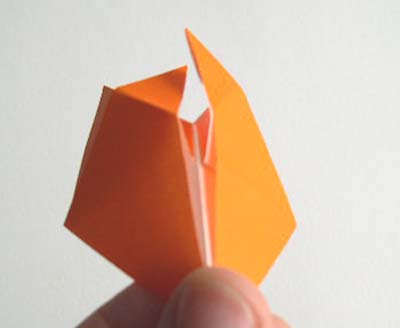 ears crossed on origami tiger